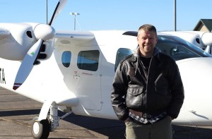 Retired Lt. Col. Command Pilot Alan Carver in front of a Cessna fixed wing, location and date not specified | Photo courtesy of Upper Limit Aviation, St. George News