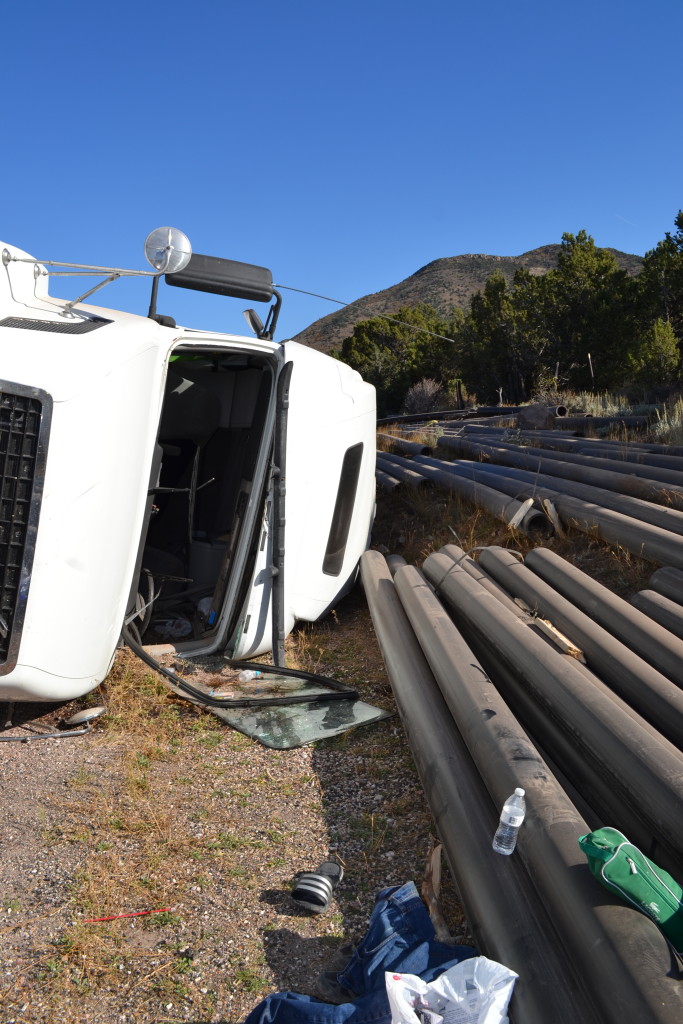 A truck carrying metal pipes rolled over on SR-56, Cedar City, Utah, Oct. 14, 2015 | Photo by Emily Hammer, St. George News