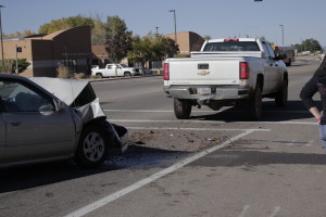 18-year-old driver rear ended a Forrest Service truck at a red light totaling her car, Main Street, Cedar City, Utah, Oct. 23, 2015 | Photo by Carin Miller, St. George News