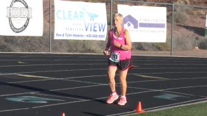 World Record Holder, 90-year-old Dottie Gray runs along the track during the 1,500 meter run event at the 2015 Huntsman Senior Games, St. George, Utah, Oct. 7, 2015 | Photo by Devan Chavez, St. George News