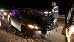 St. George Police officers and other responders went the scene of a deer versus car incident on Red Hills Parkway. While the driver was unharmed, his car was damaged and the deer involved was killed, St. George, Utah, Oct. 30, 2015 | Photo by Mori Kessler, St. George News