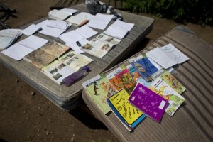 School books are laid out to dry on top of mattresses recovered from a home destroyed by Hurricane Patricia, in Chamela, Mexico. Record-breaking Patricia pushed rapidly inland over mountainous western Mexico early Saturday, weakening to tropical storm force while dumping torrential rains that authorities warned could cause deadly floods and mudslides. Chamela, Mexico, Oct. 24, 2015 | AP Photo/Rebecca Blackwell, St. George News