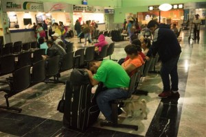 As Hurricane Patricia approaches a man dozes on his luggage while waiting for a bus out of town at the bus station in the Pacific resort city Puerto Vallarta, Mexico. Patricia grew into a monster, Category 5 storm and bore down on Mexico’s central Pacific Coast on Thursday night for what forecasters said could be a devastating blow, as officials declared a state of emergency and handed out sandbags in preparation for flooding, Puerto Vallarta, Mexico, Oct. 23, 2015| AP Photo/Cesar Rodriguez, St. George News