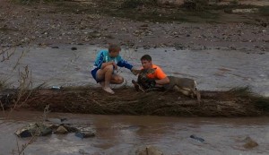 (L-R) Ethan and Braxen Glines with the deer they pulled from the Virgin River, St. George, Utah, October 2015 | Photo by Tiffany Defa, St. George News