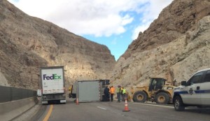 A UPS triple-unit semitrailer toppled its third trailer on Interstate 15 in the Virgin River Gorge. Mohave County, Arizona, Nov. 10, 2015 | Photo by Ric Wayman, St. George News