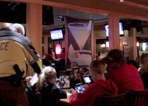 Enoch City Sgt. Mike Berg takes orders at the first Tip a Cop event of the season, Applebee's, Cedar City, Utah, Nov. 7, 2015 | Photo taken by Carin Miller, St. George News