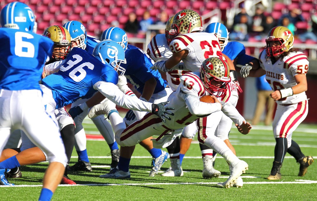 Logan's quarterback Hunter Horsley (13) dives for a first down, Dixie vs. Logan, 3AA State Football Championship, Salt Lake City, Utah, Nov. 20th, 2015, | Photo by Robert Hoppie, ASPpix.com, St. George News