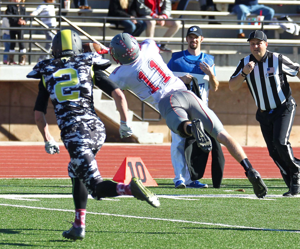 Kanab's Monte Glover (11) makes a diving catch, Diamond Ranch Academy vs. Kanab, 1A Football State Finals, Cedar City, Utah, Nov. 14th, 2015, | Photo by Robert Hoppie, ASPpix.com, St. George News