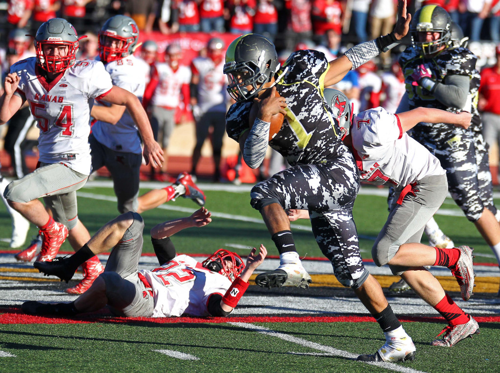 Diamond Ranch's Aaron Kern (1) breaks out for a long run during the game winning drive, Diamond Ranch Academy vs. Kanab, 1A Football State Finals, Cedar City, Utah, Nov. 14th, 2015, | Photo by Robert Hoppie, ASPpix.com, St. George News