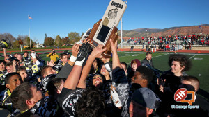 The Diamond Ranch Diamondbacks hoist the state championship trophy, Diamond Ranch Academy vs. Kanab, 1A Football State Finals, Cedar City, Utah, Nov. 14th, 2015, | Photo by Robert Hoppie, ASPpix.com, St. George News