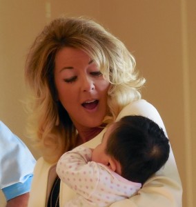 The Learning Center for Families Executive Director Suzanne Leonnelli with one of the children the organization helps, St. George, Utah, Nov. 30, 2015 | Photo by Julie Applegate, St. George News