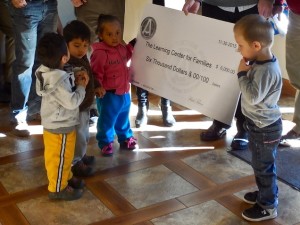 Representatives of the Associated General Contractors of Utah present a $6,000 donation to The Learning Center for Families, St. George, Utah, Nov. 30, 2015 | Photo by Julie Applegate, St. George News