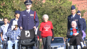 A Jr. ROTC cadet pushes an empty wheelchair at the front of the fun run line to honor POW and MIA veterans as part of the 2nd annual Veterans Day 5K and Fun Run, Ivins, Utah, Nov. 7, 2015 | Photo by Devan Chavez, St. George News