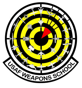 The current U.S. Air Force Weapons School’s patch design, adopted in 2012, reflects the expansion of the school, with 26 aircraft and weapons systems encircling a red “bomb on target” over a black and yellow bullseye background." | Image courtesy of the U.S. Air Force, St. George News