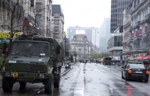 Belgian military vehicles are parked on a main avenue in Brussels on Saturday, Nov. 21, 2015. Belgium raised its security level to its highest degree on Saturday as the manhunt continues for extremist Salah Abdeslam who took part in the Paris attacks. The security levels shut down all metro lines and shuttered many shops as well as canceling sports matches, Brussels, Belgium, Nov. 21, 2015 | AP Photo by Virginia Mayo, St. George News