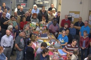 RAM Company employees gather around boxes of food they gathered and donated to the Utah Food Bank, St. George, Utah, Nov. 18, 2015 | Photo by Sheldon Demke, St. George News