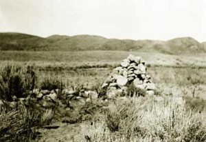 An old photograph shows a rock cairn said to have marked areas where the bones of massacre victims were buried, Mountain Meadows, date not specified | Photo courtesy of Timothy Draper, St. George News