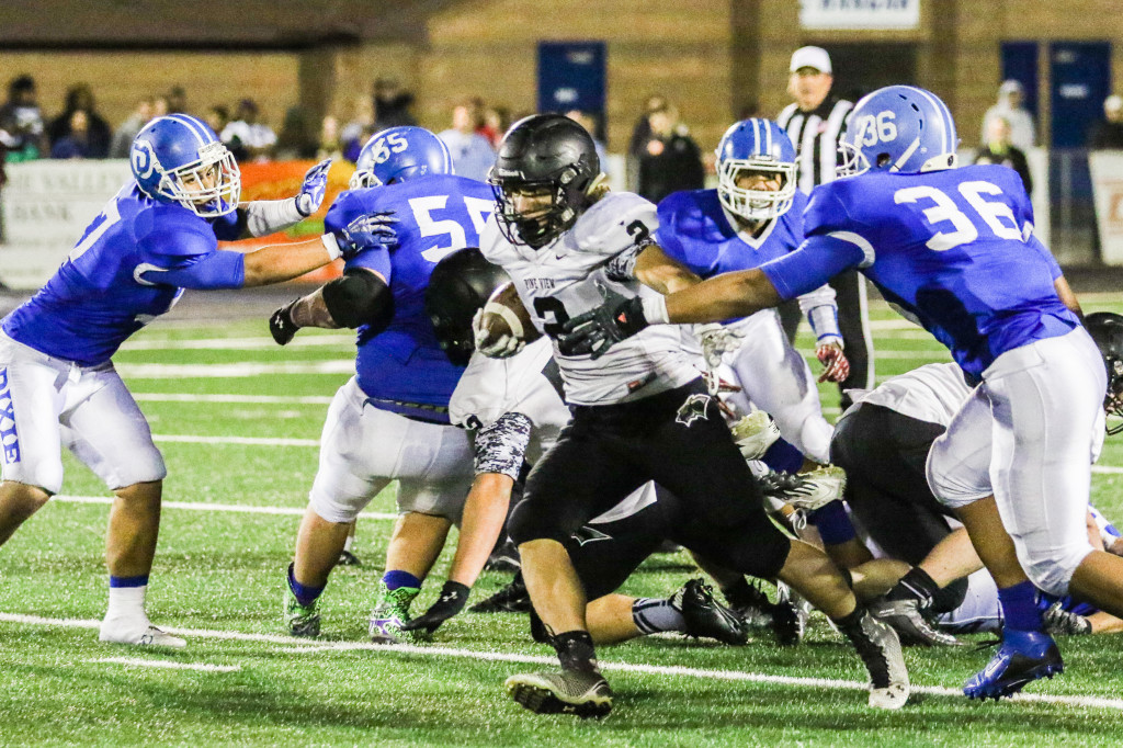 Kobe Topalian (2) from Pine View fights for yardage. Dixie vs Pine View, Football,St George, Utah, Nov. 6, 2015, | Photo by Kevin Luthy, St. George News