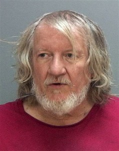 The booking photo of Michael Salata, 61, who is accused of stealing an airline boarding pass in Salt Lake City and checking into a flight to California before he was caught on Nov. 5. Salt Lake City, Utah, Nov. 6, 2015 | Photo courtesy of Salt Lake County Jail (AP), St. George News