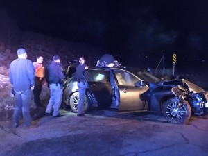 A high-speed chase Sunday night with Utah Highway Patrol and a car full of juvenile boys ended when the driver crashed into a pole after exiting Interstate 15, where juveniles fled on foot until captured. UHP was assisted by Cedar City Police and Washington County and Iron County sheriff's offices. New Harmony, Utah, Dec. 20, 2015 | Photo by Tracie Sullivan, St. George News at New Harmony, Utah, Dec. 20, 2015 | Photo by Tracie Sullivan, St. George News