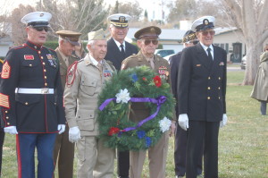 A wreath honoring the lives lost at Pearl Harbor is placed in front of a memorial located at Vernon Worthen Park, St. George, Utah, Dec. 7, 2015 | Photo by Hollie Reina, St. George News