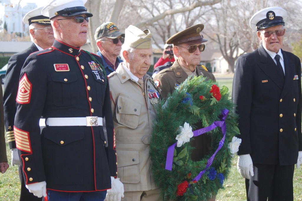 In this photo from 2015, a wreath honoring the lives lost at Pearl Harbor is placed in front of a memorial located at Vernon Worthen Park, St. George, Utah, Dec. 7, 2015 | Photo by Hollie Reina, St. George News