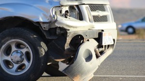 Front end damage on a 2004 Ford Explorer pickup that collided with the center guardrail on Dec. 26, 2015 | Photo by Don Gilman, St. George News