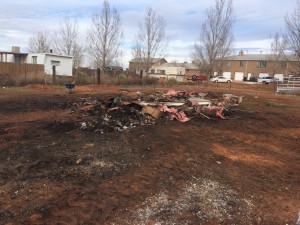 The debris left at the end of cleanup day lies where their house once stood, The Barlow's property, Centennial Park, Ariz., Dec. 19, 2015 | Courtesy of Jennifer Barlow, St. George News
