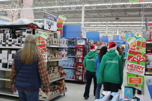 Church groups, social groups, and family groups shop for needy children at Bloomington Wal-Mart for KONY Coins for Kids, St. George, Utah, Ded. 16, 2015|Photo by Cody Blowers