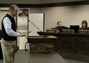 Southern Utah University Economics Professor Joe Baker introduces his class and their project to the audience in Council Chambers, Cedar City, Utah, Dec. 2, 2015 | Photo by Carin Miller, St. George News