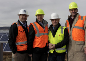 Left to right: Swinerton Renewable Energy Vice President George Hershman, Scatec Solar ASA EVP Power Production and Asset Management Torstein Bernsten, Scatec Solar North America Luigi Resta and Array Technologies President Thomas Conroy show off the solar fields at the new Utah Red Hills Renewable Park, Parowan, Utah, Dec. 10, 2015 | Photo taken by Carin Miller, St. George News