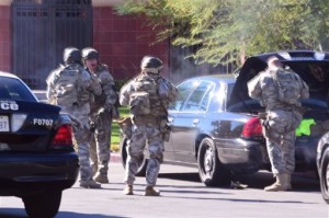A swat team arrives at the scene of a shooting. Police responded to reports of an active shooter at a social services facility, San Bernardino, Calif., Dec. 2, 2015 | Photo courtesy of Doug Saunders/Los Angeles News Group via AP, St. George News