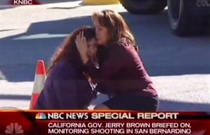 Two women comfort each other near the scene of a shooting outside a Southern California social services center, where one or more gunmen opened fire, shooting multiple people, San Bernardino, Calif., Dec. 2, 2015 | Photo courtesy of KNBC via AP, St. George News