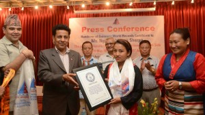 Ngim Sherpa is given a her world record certificate during the official presentation ceremony. Location and date not specified. | Photo courtesy Ngim Sherpa, St. George News