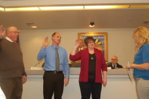 L-R Reelected councilman, Ron Densley, newly elected councilman, Dennis Mehr, newly elected councilwoman, Jenny Johnson being sworn in by Ivins City Recorder, Kari Jimenez, Ivins, Utah, January 7, 2016 | Photo by Hollie Reina, St. George News