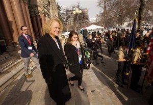 Jackie Biskupski exits a city building prior to a ceremony to swear her in as mayor.. Biskupski is Salt Lake City's first openly gay mayor. Salt Lake City, Jan. 4, 2016 | Photo courtesy of Scott G Winterton of The Deseret News via AP, St. George News