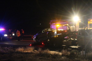 Beige Pontiac as it is towed from accident on Washington Parkway and E. Telegraph, Washington, Utah, Jan. 9, 2016 | Photo by Cody Blowers, St. George News