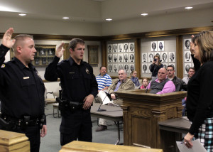 City Recorder Renon Savage swears in Cedar City's newest police officers Stenson Bergstrom and Aemonn Taylor, City Council Chambers, Cedar City, Utah, Jan. 13, 2016 | Photo by Carin Miller, St. George News