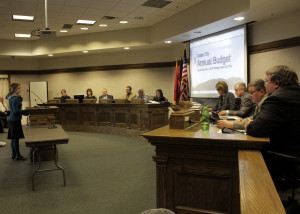 Cedar City intern and Cedar High School senior Kristen Arnell presents the 2015-2016 Annual Budget document she compiled to City Council and administrators, Council Chambers, Cedar City, Utah, Jan. 20, 2016 | Photo by Carin Miller, St. George News