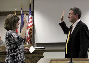 Returning Councilman Paul Cozzens takes his oath of service Wednesday night before a room full of onlookers, Cedar City Council Chambers, Cedar City, Utah, Jan. 06, 2016 | Photo by Carin Miller, St George News