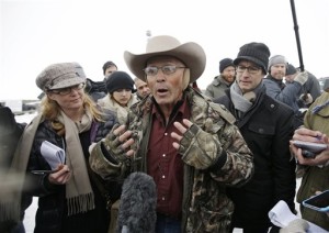 LaVoy Finicum, a rancher from Arizona, who is part of the group occupying the Malheur National Wildlife Refuge speaks with reporters during a news conference at the the refuge. Law enforcement had yet to take any action against the group numbering close to two dozen who are upset over federal land policy. Finicum said the group would examine the underlying land ownership transactions to begin to "unwind it," stating he was eager to leave Oregon, near Burns, Oregon, Jan. 5, 2016 | AP Photo by Rick Bowmer, St. George News
