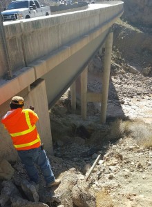 A worker operating a sweeper vehicle fell 75 feet off southbound I-15 near milepost 16, Mohave County, Arizona, Jan. 27, 2016 | Photo courtesy of Chief Jeff Hunt, Beaver Dam-Littlefield Fire Department, St. George News