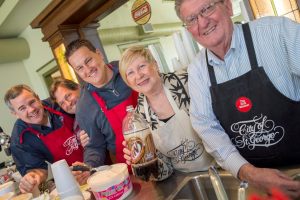 In this photo from 2015 city council members join St. George Mayor Jon Pike in serving root beer floats to the community, St. George, Utah, January, 2015 | Photo by Dave Becker, St. George News