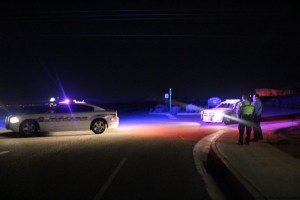 Police units blocking access to the turn off into Pioneer Park as responders deal with a rollover on the east side of the Dixie Rock, St. George, Utah, Jan. 27, 2016 | Photo by Mori Kessler, St. George News