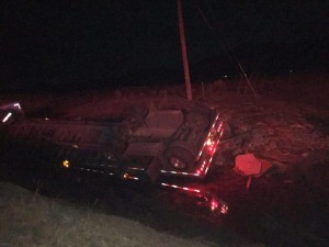 Semi truck filled with granite rolls over Wednesday near Cedar City, Utah, Feb. 24, 2016 | Photo by Tracie Sullivan Cedar City News