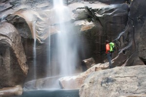 SUU Outdoor Education Series speaker Keith Howells hikes in the mist of the waterfalls, Location and date unspecified | Courtesy of Keith Howells, St. George News