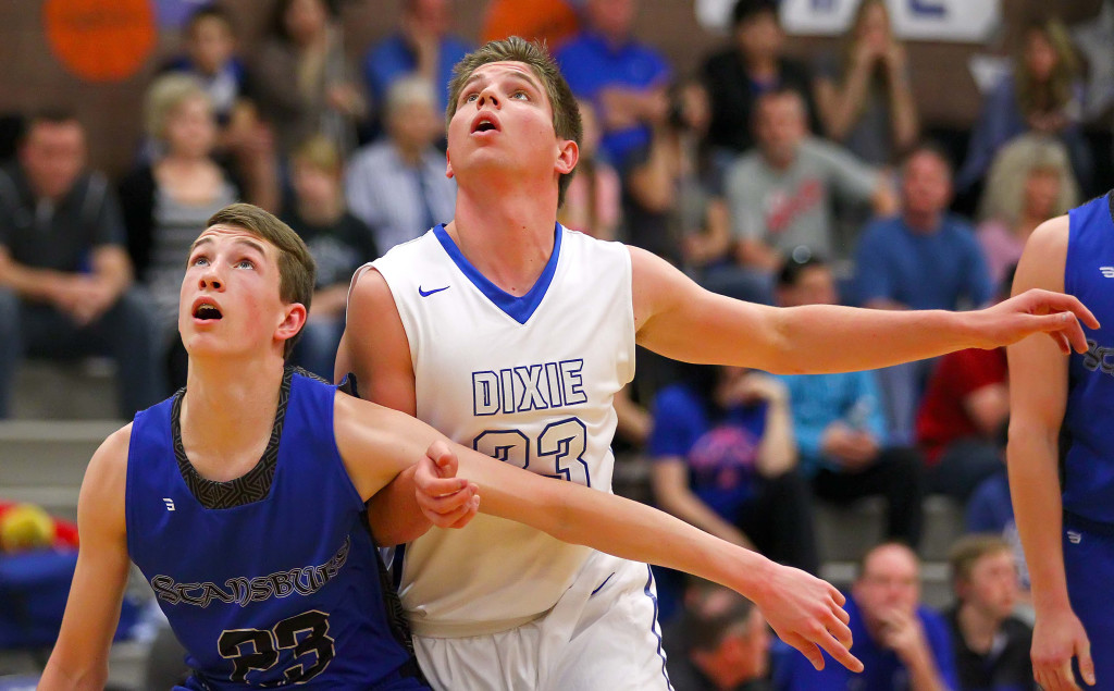 Dixie's James Eardley (23) and Stansbury's Josh Jenkins, Dixie vs. Stansbury, Boys Basketball, St. George, Utah, Feb. 20, 2016, | Photo by Robert Hoppie, ASPpix.com, St. George News