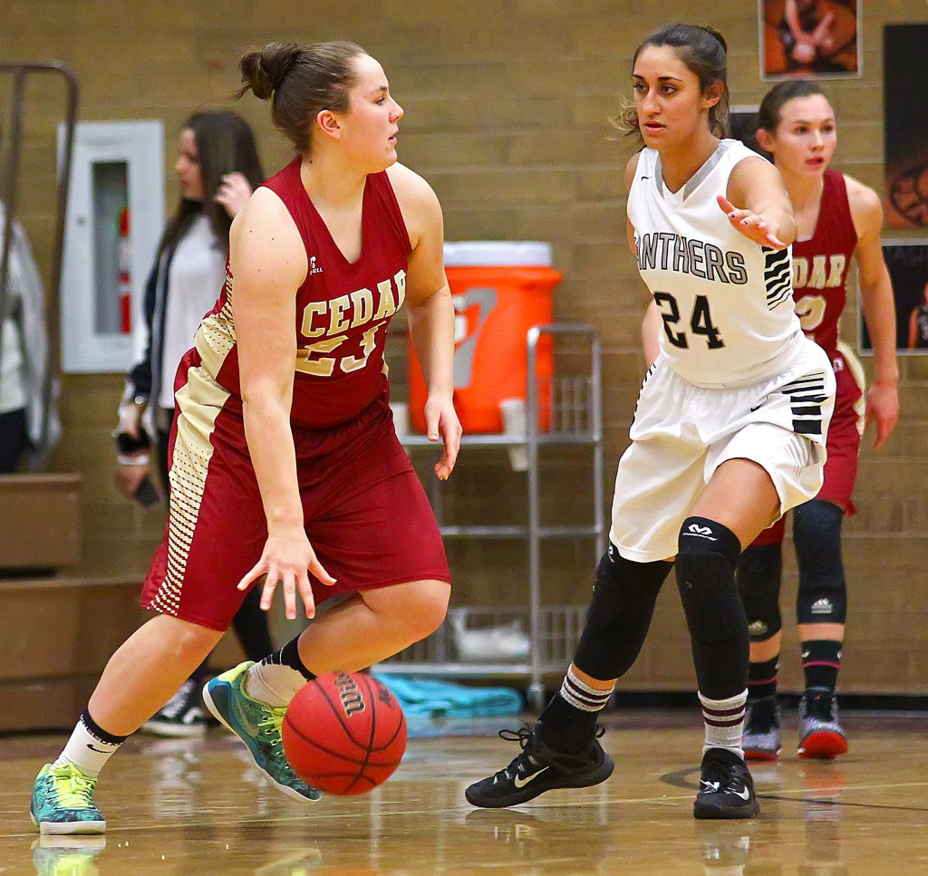 Cedar's  Courtney Morley (23) and Pine View's  Tayvia AhQuin (24), Pine View vs. Cedar, Girls Basketball, St. George, Utah, Feb. 4, 2016, | Photo by Robert Hoppie, ASPpix.com, St. George News