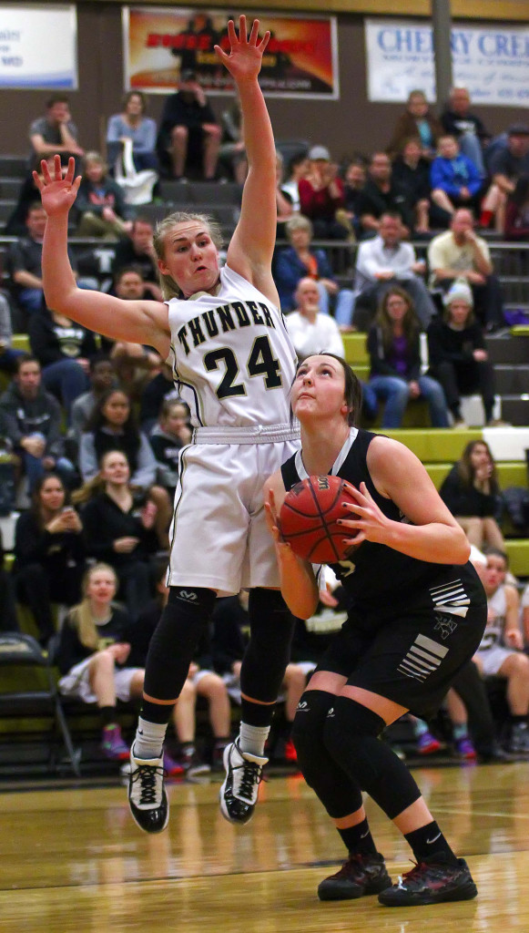 Pine View's  Sarrah Pierce (5) and Desert Hills'  Ashley Beckstrand (24), Desert Hills vs. Pine View, Girls Basketball, St. George, Utah, Feb. 9, 2016, | Photo by Robert Hoppie, ASPpix.com, St. George News