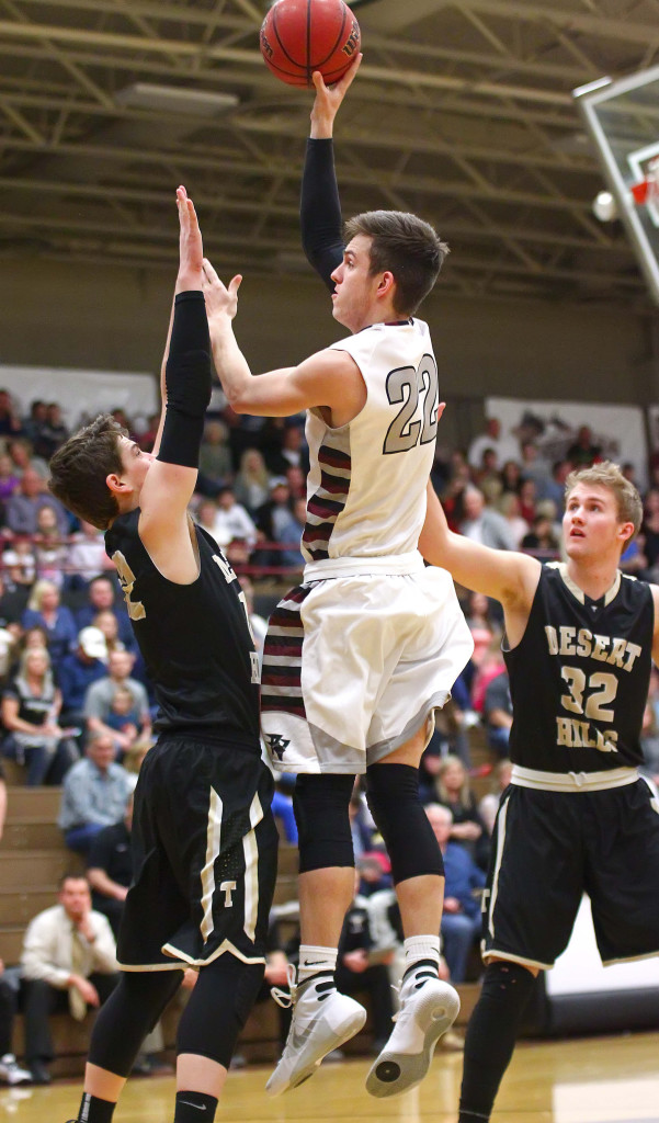 Pine View's Cody Ruesch (22) shoots over Desert Hills' Marcus Mckone (12), Pine View vs. Desert Hills, Boys Basketball, St. George, Utah, Feb. 10, 2016, | Photo by Robert Hoppie, ASPpix.com, St. George News